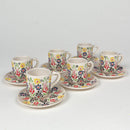 Set de cafea alb din ceramică, pictat manual de DELUMANI, include cești și farfurii pentru cafea elegantă și artistică.